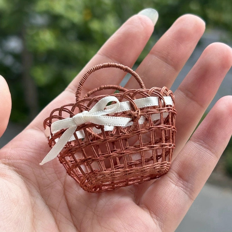 Bow openwork woven basket